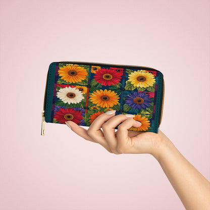 Glänzende Clutch aus Leder mit Trageriemen und leuchtendem Gänseblümchen-Aufnäher