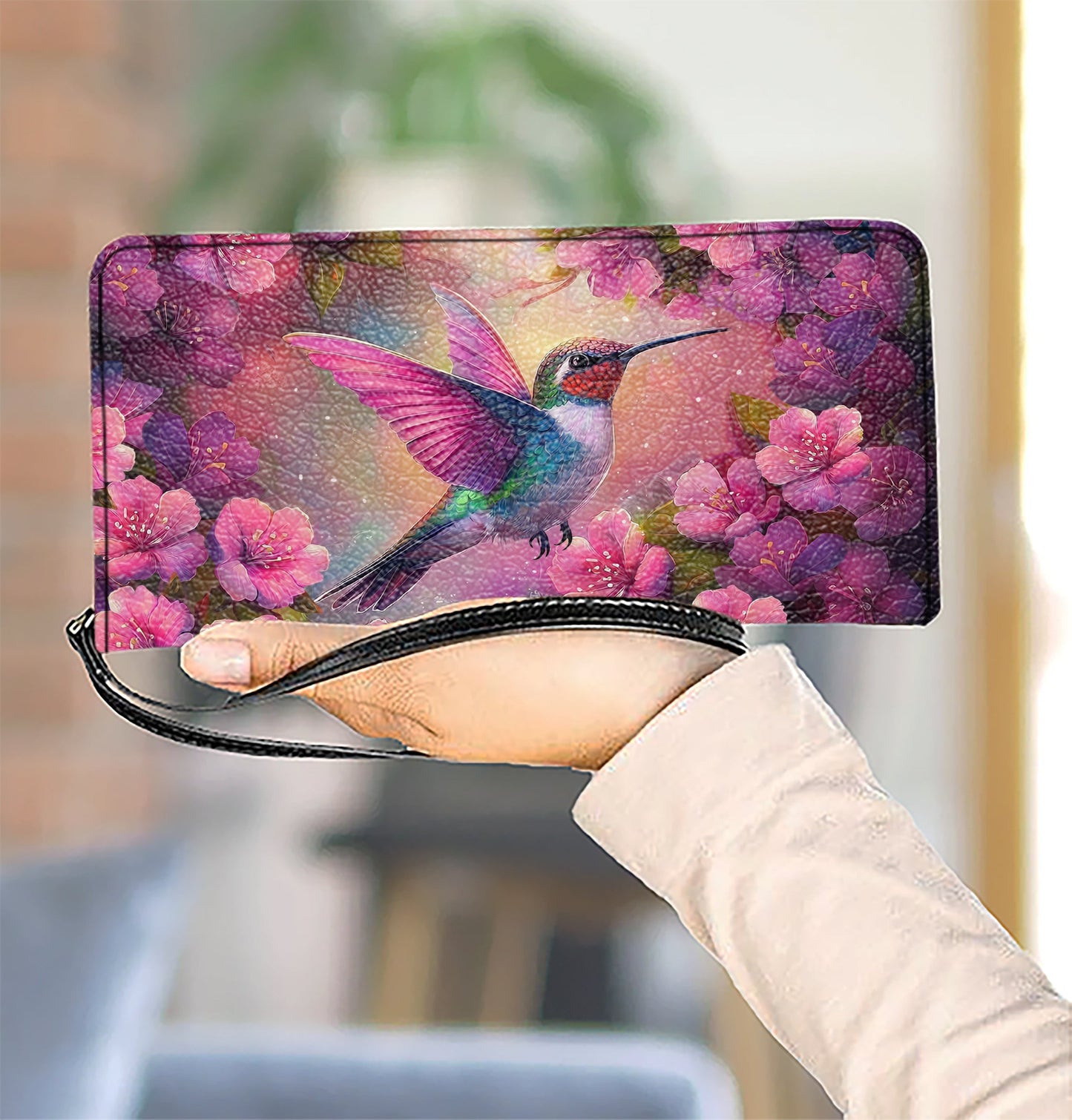 Pochette en cuir brillante avec dragonne et poignée Motif colibri en fleurs