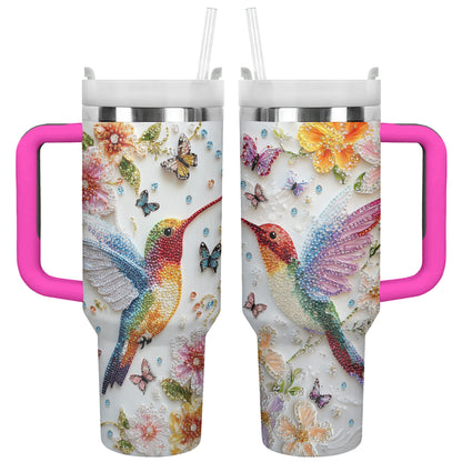 Glänzender, glänzender Becher mit Blumen-Kolibri und Schmetterlingen