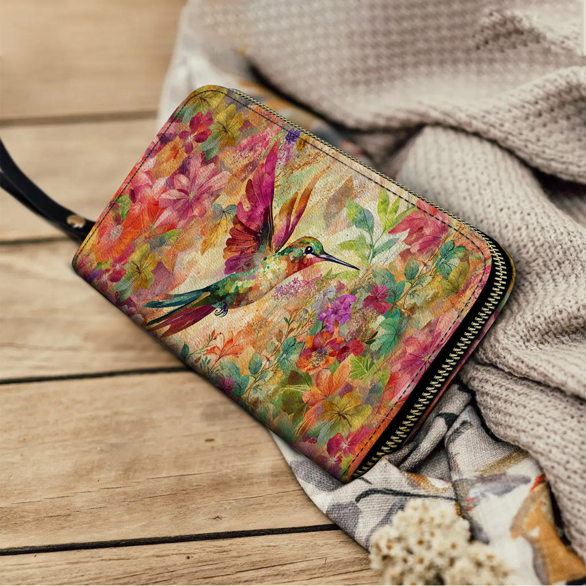 Pochette en cuir brillante avec dragonne et poignée Hummingbird Bliss