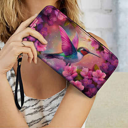 Pochette en cuir brillante avec dragonne et poignée Motif colibri en fleurs