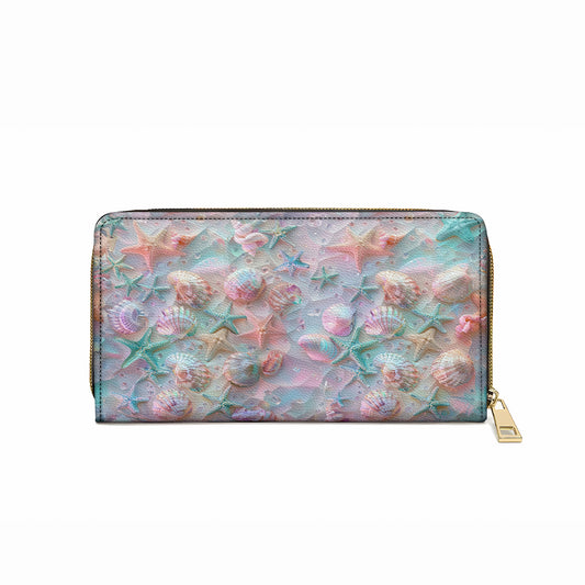 Glänzende Clutch aus Leder mit Trageriemen und Küstenmuschel-Motiv