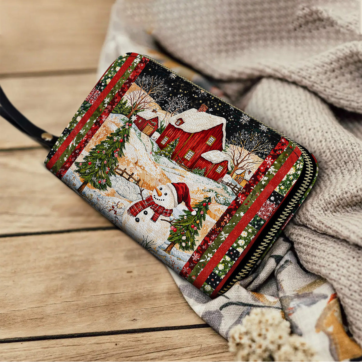 Glänzende Clutch aus Leder mit Trageriemen und Schneemann-Weihnachtstraum