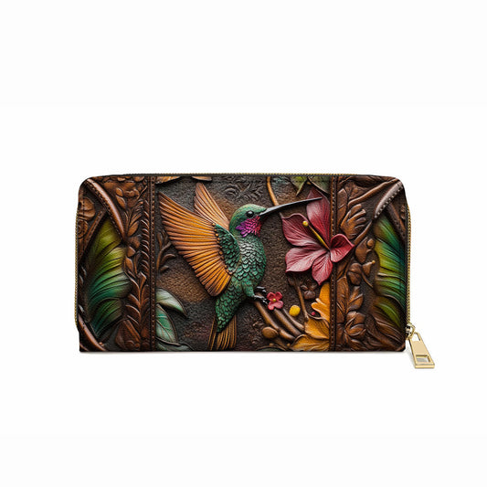 Glänzende Clutch aus Leder mit Trageriemen und Kolibri-Prägung