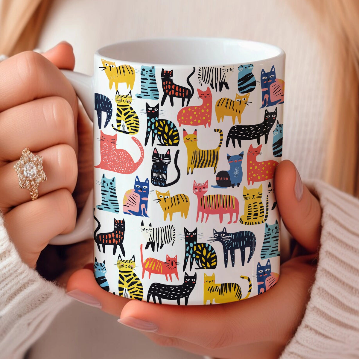 Tasse en céramique brillante avec des gribouillages de chats colorés