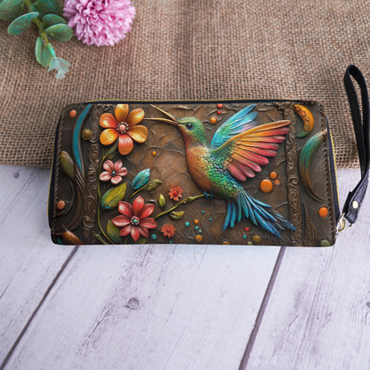 Pochette en cuir brillante avec dragonne et poignée motif colibri et fleur