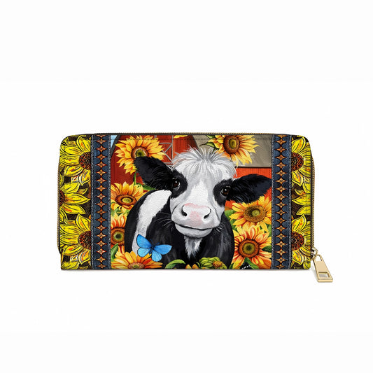 Pochette en cuir brillant avec dragonne et poignée en forme de tournesol et de vache laitière