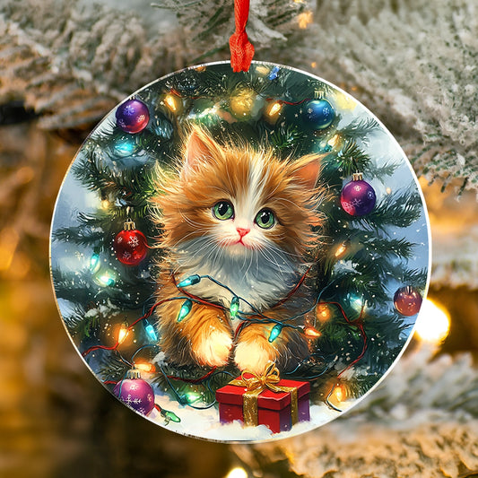 Décoration brillante en acrylique sous le sapin avec un chaton de Noël 