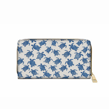 Pochette en cuir brillant avec dragonne et poignée en forme de tortue de mer douce