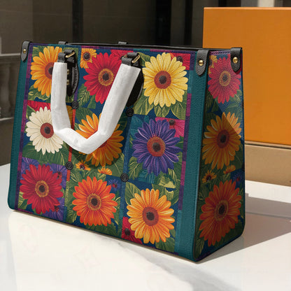 Sac en cuir brillant avec patch marguerite vibrant