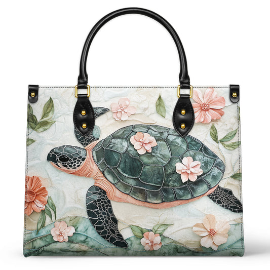 Sac en cuir brillant motif tortue florale