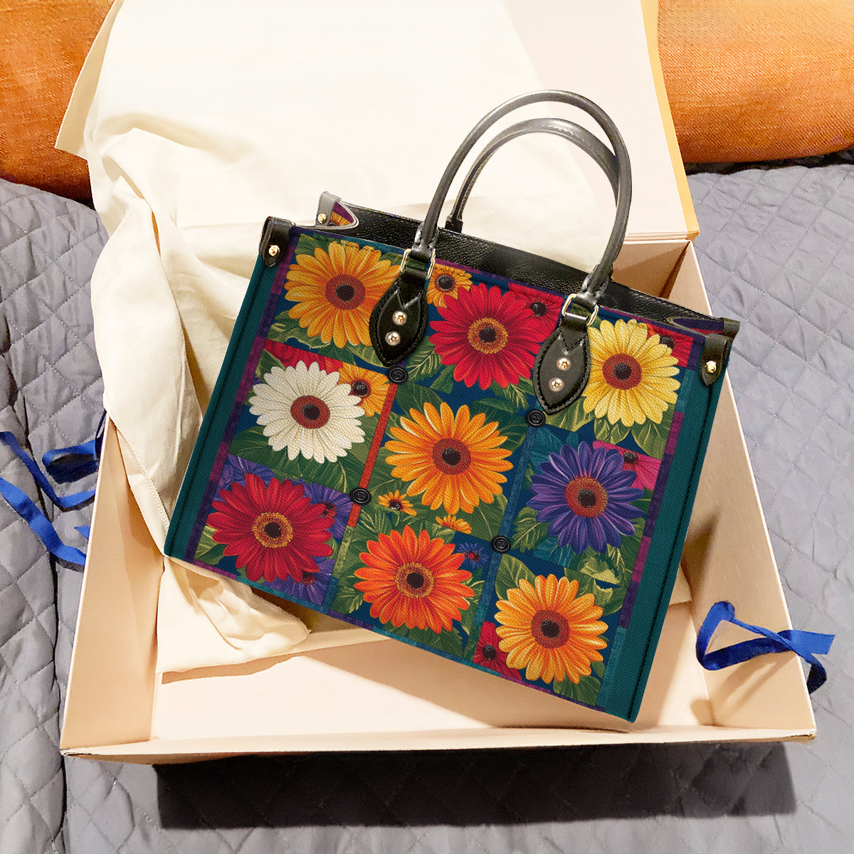 Sac en cuir brillant avec patch marguerite vibrant