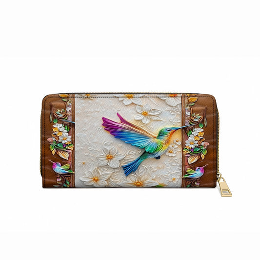 Pochette en cuir brillante avec dragonne et anse flottante