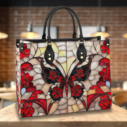 Sac en cuir brillant motif papillon mosaïque