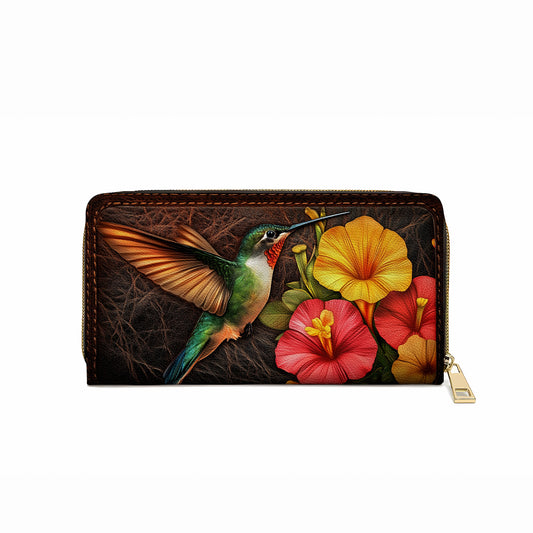 Pochette en cuir brillant avec dragonne et poignée Motif colibri tropical