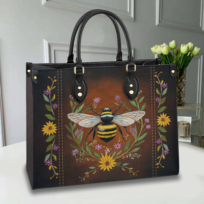 Sac en cuir brillant à fleurs bourdonnantes