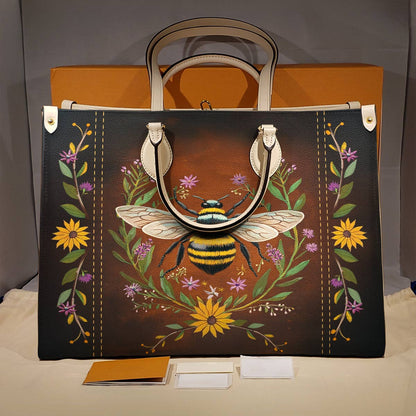 Sac en cuir brillant à fleurs bourdonnantes