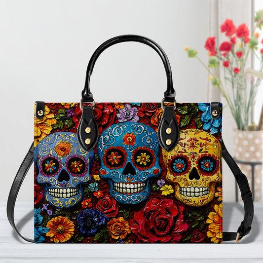 Sac en cuir brillant motif tête de mort florale